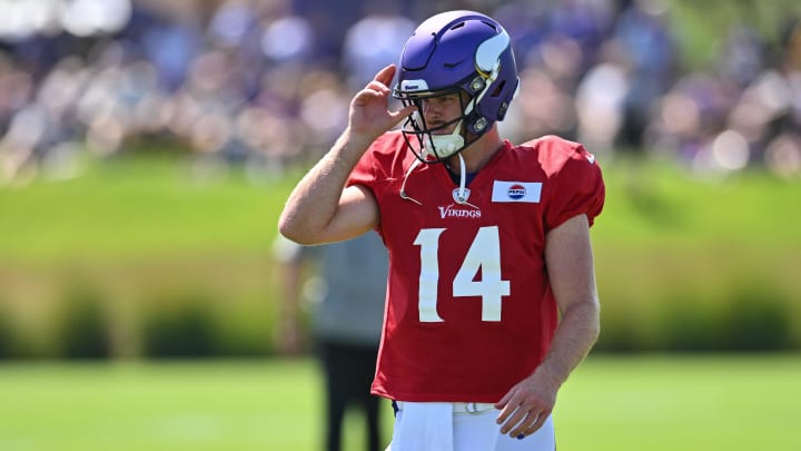 Aug 2, 2024; Eagan, MN, USA; Minnesota Vikings quarterback Sam Darnold (14) warms up during practice at Vikings training camp in Eagan, MN.