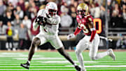 Oct 25, 2024; Chestnut Hill, Massachusetts, USA; Louisville Cardinals wide receiver Chris Bell (0) runs after making a catch against the Boston College Eagles during the first half at Alumni Stadium. Mandatory Credit: Eric Canha-Imagn Images