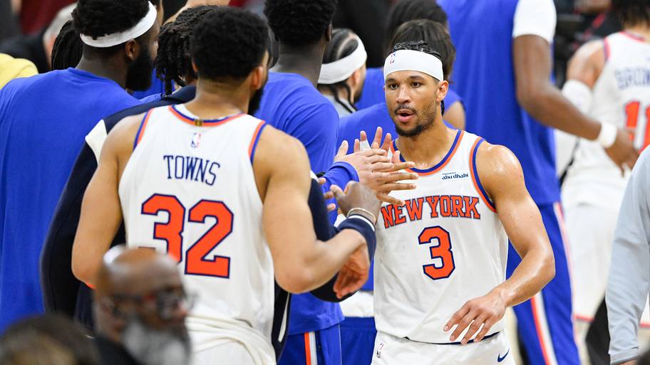 Knicks forward Josh Hart high fives teammates after defeating the Cavaliers in Game 3 of the Eastern Conference finals.
