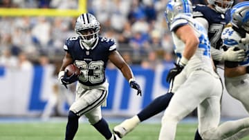 Dec 4, 2025; Detroit, Michigan, USA; Dallas Cowboys running back Javonte Williams (33) runs during the first half against the Detroit Lions at Ford Field. Mandatory Credit: Lon Horwedel-Imagn Images