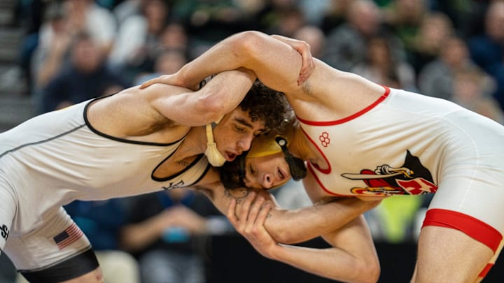 Saint John Vianney’s Anthony Knox, left, wrestles Bergen Catholic’s Nathan Braun in the championship XX match during finals of the NJSIAA individual wrestling state championships at Boardwalk Hall in Atlantic City on Friday, March 8, 2025. Saint John Vianney’s Anthony Knox is awarded the 126lb state championship title and is a 4-time state champion.
