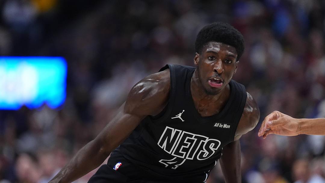Jan 29, 2026; Denver, Colorado, USA; Brooklyn Nets guard Drake Powell (4) controls the ball in the second half against the Denver Nuggets at Ball Arena. Mandatory Credit: Ron Chenoy-Imagn Images