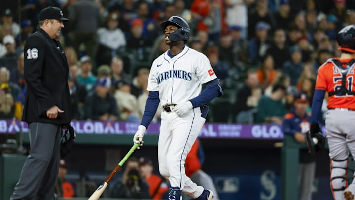 Apr 8, 2025; Seattle, Washington, USA; Seattle Mariners second baseman Ryan Bliss (1) reacts after striking out to end the second inning against the Houston Astros at T-Mobile Park. Mandatory Credit: Joe Nicholson-Imagn Images