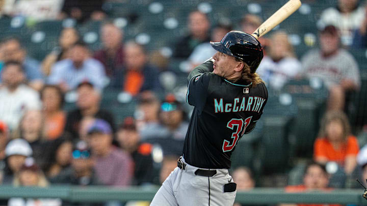 Arizona Diamondbacks left fielder Jake McCarthy hits a home run.