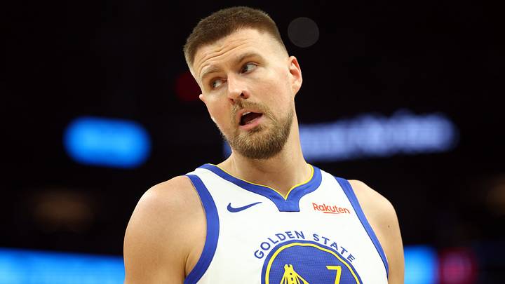 Apr 17, 2026; Phoenix, Arizona, USA; Golden State Warriors center Kristaps Porzingis (7) against the Phoenix Suns during the play-in rounds of the 2026 NBA Playoffs at Mortgage Matchup Center. Mandatory Credit: Mark J. Rebilas-Imagn Images