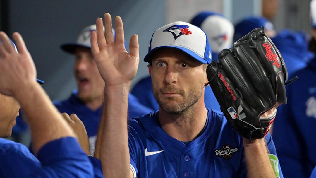 Oct 27, 2025; Los Angeles, California, USA; Toronto Blue Jays pitcher Max Scherzer (31) reacts in the dugout after being relieved in the fifth inning against the Los Angeles Dodgers during game three of the 2025 MLB World Series at Dodger Stadium. Mandatory Credit: Jayne Kamin-Oncea-Imagn Images