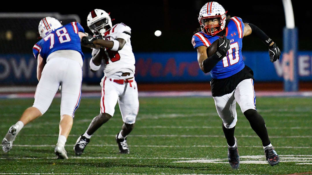 Washington Township's Jaylen Robinson runs the ball in for a touchdown during the 4th quarter of the Central Jersey Group 5 football semifinal playoff game between Washington Township and Rancocas Valley played at Washington Township High School on Friday, November 7, 2025. Washington Township defeated Rancocas Valley, 44-26.