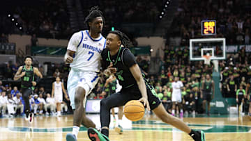 USF's Kobe Knox said he would sometimes be reminded of his late coach, Amir Abdur-Rahim, when he looked into the student cheering section