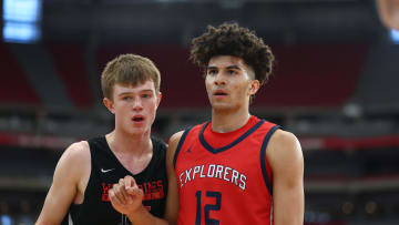 Jun 25, 2023; Glendale, AZ, USA; Columbus player Cameron Boozer (12) against Columbus Explorers player Nikolas Khamenia during the Section 7 high school boys tournament at State Farm Stadium. Mandatory Credit: Mark J. Rebilas-USA TODAY Sports