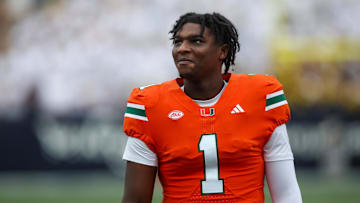 Nov 9, 2024; Atlanta, Georgia, USA; Miami Hurricanes quarterback Cam Ward (1) on the sideline against the Georgia Tech Yellow Jackets in the first quarter at Bobby Dodd Stadium at Hyundai Field. Mandatory Credit: Brett Davis-Imagn Images