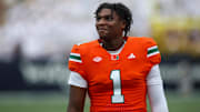 Nov 9, 2024; Atlanta, Georgia, USA; Miami Hurricanes quarterback Cam Ward (1) on the sideline against the Georgia Tech Yellow Jackets in the first quarter at Bobby Dodd Stadium at Hyundai Field. Mandatory Credit: Brett Davis-Imagn Images
