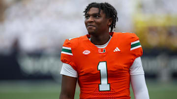 Nov 9, 2024; Atlanta, Georgia, USA; Miami Hurricanes quarterback Cam Ward (1) on the sideline against the Georgia Tech Yellow Jackets in the first quarter at Bobby Dodd Stadium at Hyundai Field. Mandatory Credit: Brett Davis-Imagn Images