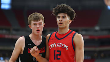 Jun 25, 2023; Glendale, AZ, USA; Duke basketball players Cameron Boozer (12) and Nikolas Khamenia during the Section 7 high school boys tournament at State Farm Stadium.