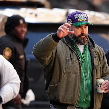 Jason Kelce waves to fans during the Super Bowl LIX championship parade and rally. 