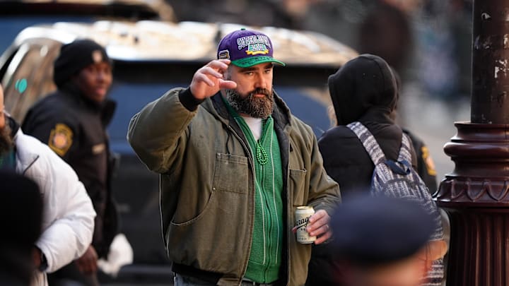 Jason Kelce waves to fans during the Super Bowl LIX championship parade and rally. Jason Kelce waves to fans during the Super Bowl LIX championship parade and rally.