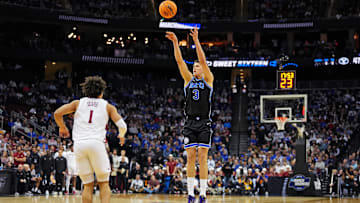Mar 27, 2025; Newark, NJ, USA; Brigham Young Cougars guard Egor Demin (3) shoots the ball against Alabama Crimson Tide guard Mark Sears (1) during the second half during an East Regional semifinal of the 2025 NCAA tournament at Prudential Center. Mandatory Credit: Robert Deutsch-Imagn Images
