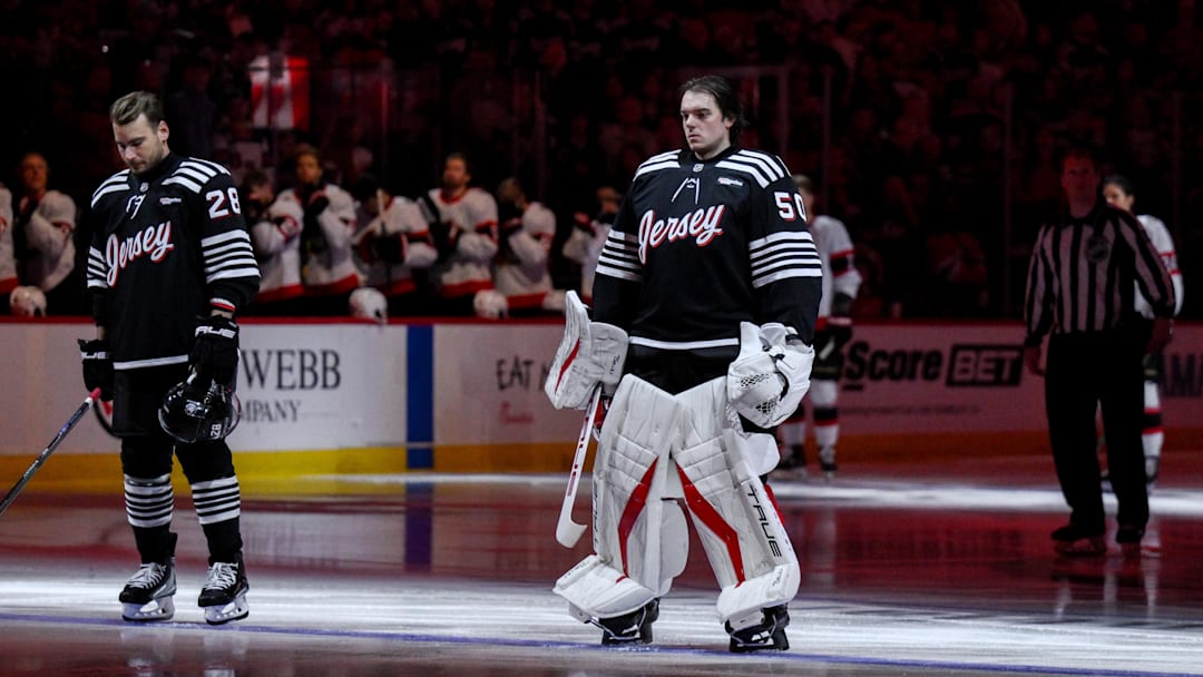 Apr 12, 2026; Newark, New Jersey, USA; New Jersey Devils goaltender Nico Daws (50) stands during the national anthem before the game against the Ottawa Senators at Prudential Center. Mandatory Credit: John Jones-Imagn Images