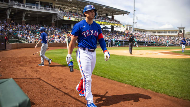 Mar 18, 2024; Surprise, Arizona, USA; Texas Rangers designated hitter Justin Foscue against the Seattle Mariners during a spring training baseball game at Surprise Stadium. Mandatory Credit: Mark J. Rebilas-USA TODAY Sports