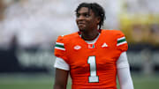 Nov 9, 2024; Atlanta, Georgia, USA; Miami Hurricanes quarterback Cam Ward (1) on the sideline against the Georgia Tech Yellow Jackets in the first quarter at Bobby Dodd Stadium at Hyundai Field. Mandatory Credit: Brett Davis-Imagn Images
