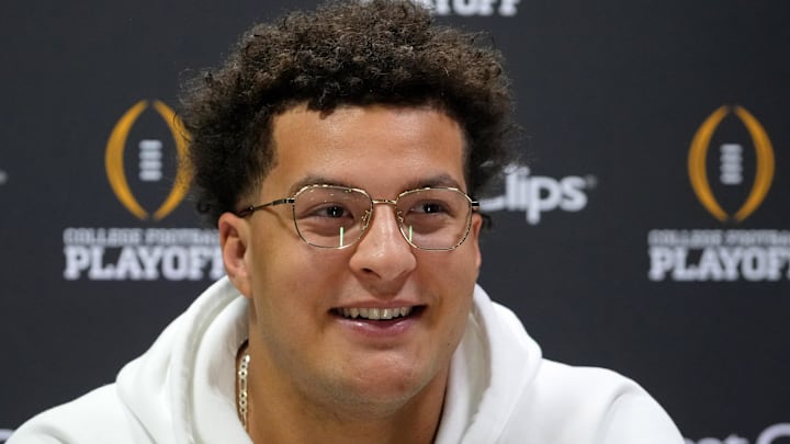 Notre Dame Fighting Irish defensive lineman Howard Cross III (56) talks to the media during 2025 CFP National Championship Media Day.