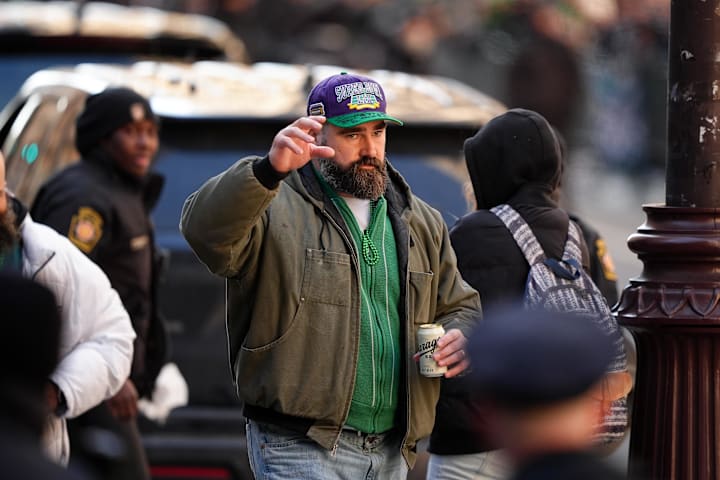 Jason Kelce waves to fans during the Super Bowl LIX championship parade and rally. 