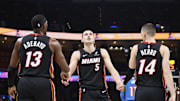 Feb 12, 2025; Oklahoma City, Oklahoma, USA; Miami Heat forward Nikola Jovic (5) celebrates with teammates center Bam Adebayo (13) and guard Tyler Herro (14) after a play against the Oklahoma City Thunder during the second quarter at Paycom Center. Mandatory Credit: Alonzo Adams-Imagn Images