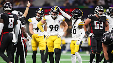 Sep 8, 2024; Atlanta, Georgia, USA; Pittsburgh Steelers linebacker T.J. Watt (90) reacts with cornerback Donte Jackson (26) after a penalty against the Atlanta Falcons in the second quarter at Mercedes-Benz Stadium. Mandatory Credit: Brett Davis-Imagn Images