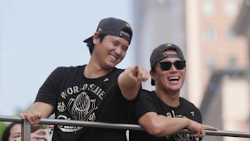 Nov 3, 2025; Los Angeles, CA, USA;  Los Angeles Dodgers two-way player Shohei Ohtani (17) and pitcher Yoshinobu Yamamoto (18) during the World Series championship parade and celebration. Mandatory Credit: Kirby Lee-Imagn Images