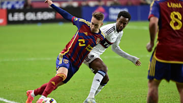 Real Salt Lake midfielder Dminik Marczuk (11) dribbles the ball against Vancouver Whitecaps FC defender Ali Ahmed (22)