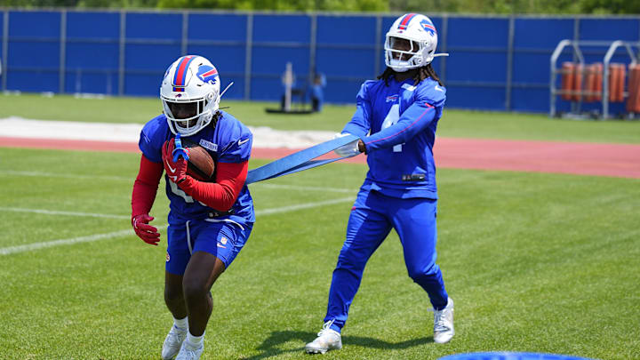 Jun 11, 2025; Orchard Park, NY, USA; Buffalo Bills running back Frank Gore Jr. (20) works out with running back James Cook (4) during Minicamp at Highmark Stadium