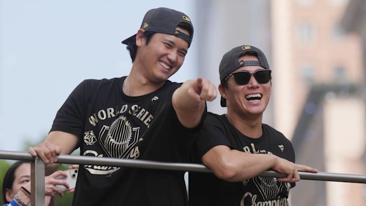 Los Angeles Dodgers two-way player Shohei Ohtani and pitcher Yoshinobu Yamamoto celebrate during the World Series championship parade and celebration. Ohtani later addressed the Dodgers fans in attendance in English.