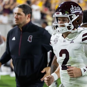 Mississippi State Bulldogs quarterback Blake Shapen (2) and coach Jeff Lebby against the Arizona State Sun Devils at Mountain America Stadium. 