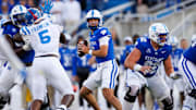 Sep 6, 2025; Lexington, Kentucky, USA; Kentucky Wildcats quarterback Cutter Boley (8) looks to pass during the fourth quarter against the Mississippi Rebels at Kroger Field. Mandatory Credit: Jordan Prather-Imagn Images