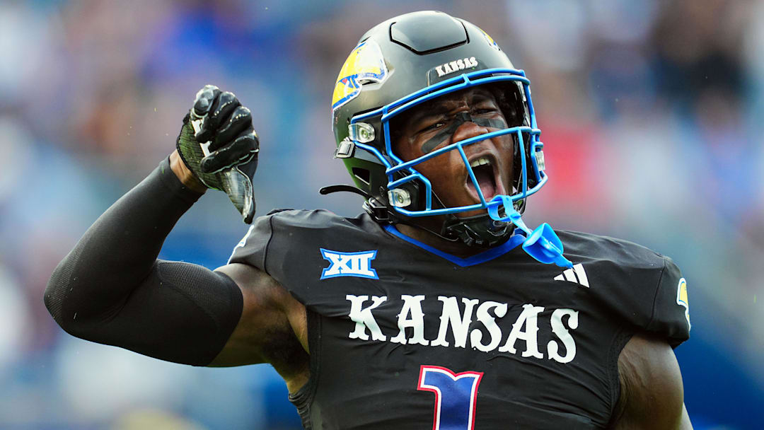 Sep 13, 2024; Kansas City, Kansas, USA; Kansas Jayhawks linebacker JB Brown (1) celebrates after a play during the first half against the UNLV Rebels at Children's Mercy Park. Mandatory Credit: Jay Biggerstaff-Imagn Images