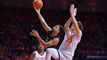 Jan 21, 2024; Champaign, Illinois, USA; Rutgers Scarlet Knights guard Noah Fernandes (1) drives to