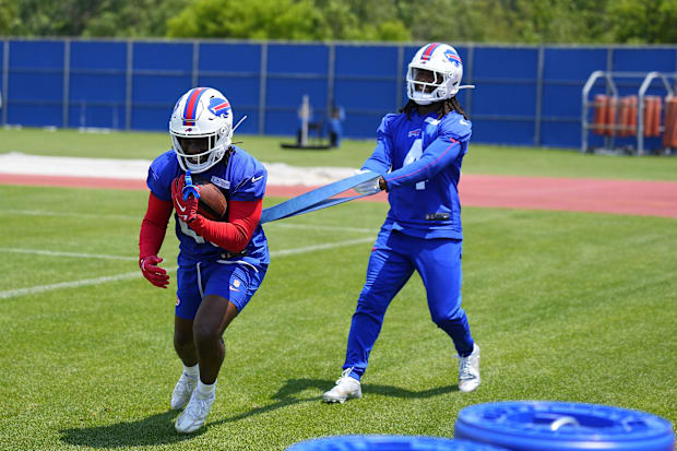 Buffalo Bills running back Frank Gore Jr. works out with running back James Cook during Minicamp at Highmark Stadium.