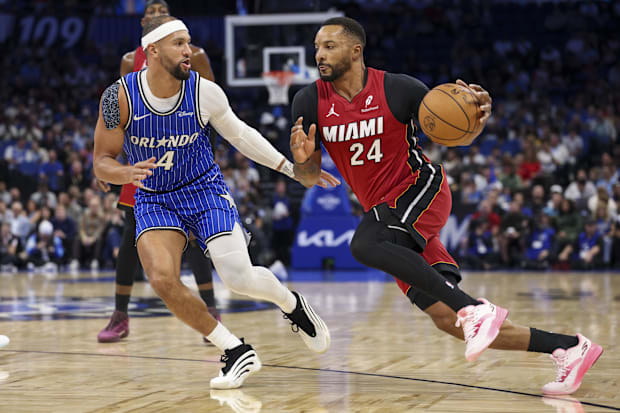 Heat guard Norman Powell drives to the hoop past Magic guard Jalen Suggs.