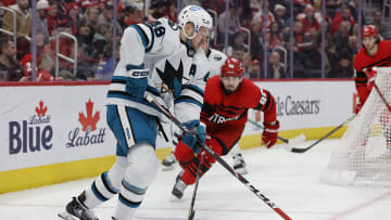 Jan 24, 2023; Detroit, Michigan, USA; San Jose Sharks center Tomas Hertl (48) skates with the puck chased by Detroit Red Wings defenseman Jake Walman (96) in the third period at Little Caesars Arena. Mandatory Credit: Rick Osentoski-USA TODAY Sports