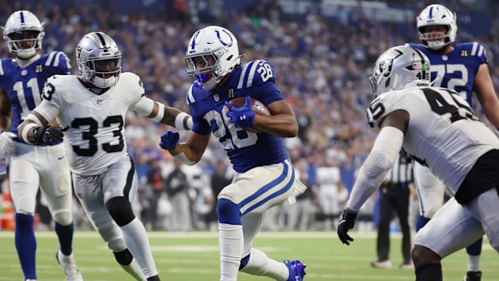 Indianapolis Colts running back Jonathan Taylor (28) scores a touchdown against the Las Vegas Raiders during the second half at Lucas Oil Stadium. Indianapolis Colts running back Jonathan Taylor (28) scores a touchdown against the Las Vegas Raiders during the second half at Lucas Oil Stadium.