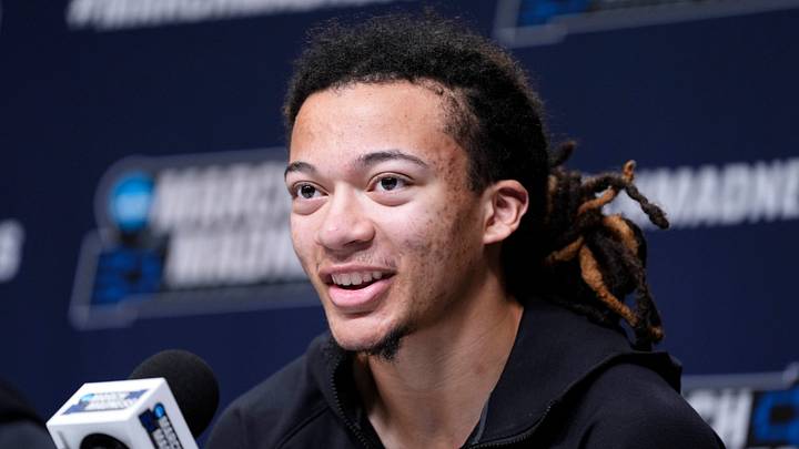 Houston's Kingston Flemings speaks during a press conference for the first round of the NCAA basketball tournament at Paycom Center in Oklahoma City, Wednesday, March 18, 2026.