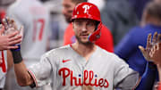Jun 27, 2025; Atlanta, Georgia, USA; Philadelphia Phillies shortstop Trea Turner (7) celebrates with teammates after a home run against the Atlanta Braves in the ninth inning at Truist Park