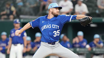 Mar 25, 2025; Arlington, Texas, USA;  Kansas City Royals relief pitcher Chris Stratton (35) delivers a pitch to the Texas Rangers during the sixth inning at Globe Life Field. Mandatory Credit: Jim Cowsert-Imagn Images
