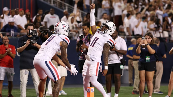 Arizona's Noah Fifita Celebrating with Tetairoa McMillan