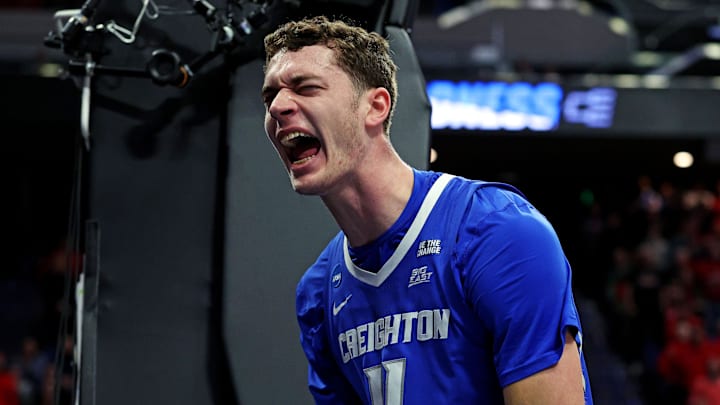 Mar 20, 2025; Lexington, KY, USA; Creighton Bluejays center Ryan Kalkbrenner (11) reacts after a play during the first half against the Louisville Cardinals in the first round of the NCAA Tournament at Rupp Arena. Mar 20, 2025; Lexington, KY, USA; Creighton Bluejays center Ryan Kalkbrenner (11) reacts after a play during the first half against the Louisville Cardinals in the first round of the NCAA Tournament at Rupp Arena.