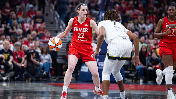 May 17, 2025; Indianapolis, Indiana, USA; Indiana Fever guard Caitlin Clark (22) dribbles the ball while Chicago Sky guard Ariel Atkins (7) defends in the first half at Gainbridge Fieldhouse. Mandatory Credit: Trevor Ruszkowski-Imagn Images May 17, 2025; Indianapolis, Indiana, USA; Indiana Fever guard Caitlin Clark (22) dribbles the ball while Chicago Sky guard Ariel Atkins (7) defends in the first half at Gainbridge Fieldhouse. Mandatory Credit: Trevor Ruszkowski-Imagn Images