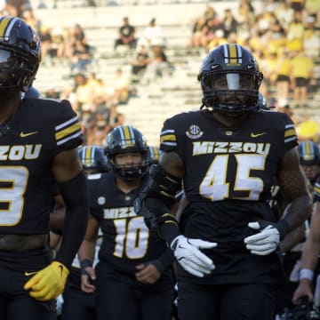 Aug 29, 2024; Columbia, Missouri, USA; Missouri Tigers defensive back Daylan Carnell (13) leads a group of his teammates back to the locker room prior to facing the Murray State Racers at Faurot Field.