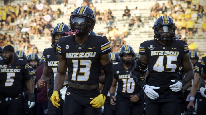 Aug 29, 2024; Columbia, Missouri, USA; Missouri Tigers defensive back Daylan Carnell (13) leads a group of his teammates back to the locker room prior to facing the Murray State Racers at Faurot Field.