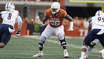 Sep 14, 2024; Austin, Texas, USA; Texas Longhorns offensive lineman Cameron Williams (56) blocks during the first half against the Texas-San Antonio Roadrunners at Texas at Darrell K Royal-Texas Memorial Stadium.