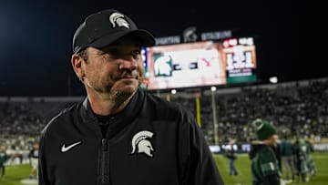 Sep 6, 2025; East Lansing, Michigan, USA; Michigan State head coach Jonathan Smith walks across the field following  a double-overtime victory over Boston College at Spartan Stadium. Mandatory Credit: Brendan Mullin-Imagn Images
