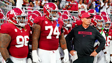 Sep 28, 2024; Tuscaloosa, Alabama, USA; Alabama Crimson Tide head coach Kalen DeBoer leads his team onto the field before the game against the Georgia Bulldogs at Bryant-Denny Stadium. Mandatory Credit: John David Mercer-Imagn Images